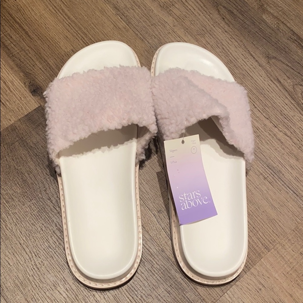 Pink fuzzy house slippers